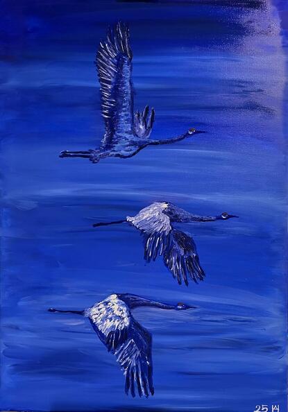 Kranichflug zur blauen Stunde