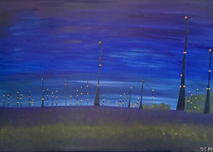 Im Bau befindliche Windkraftanlagen zur blauen Stunde